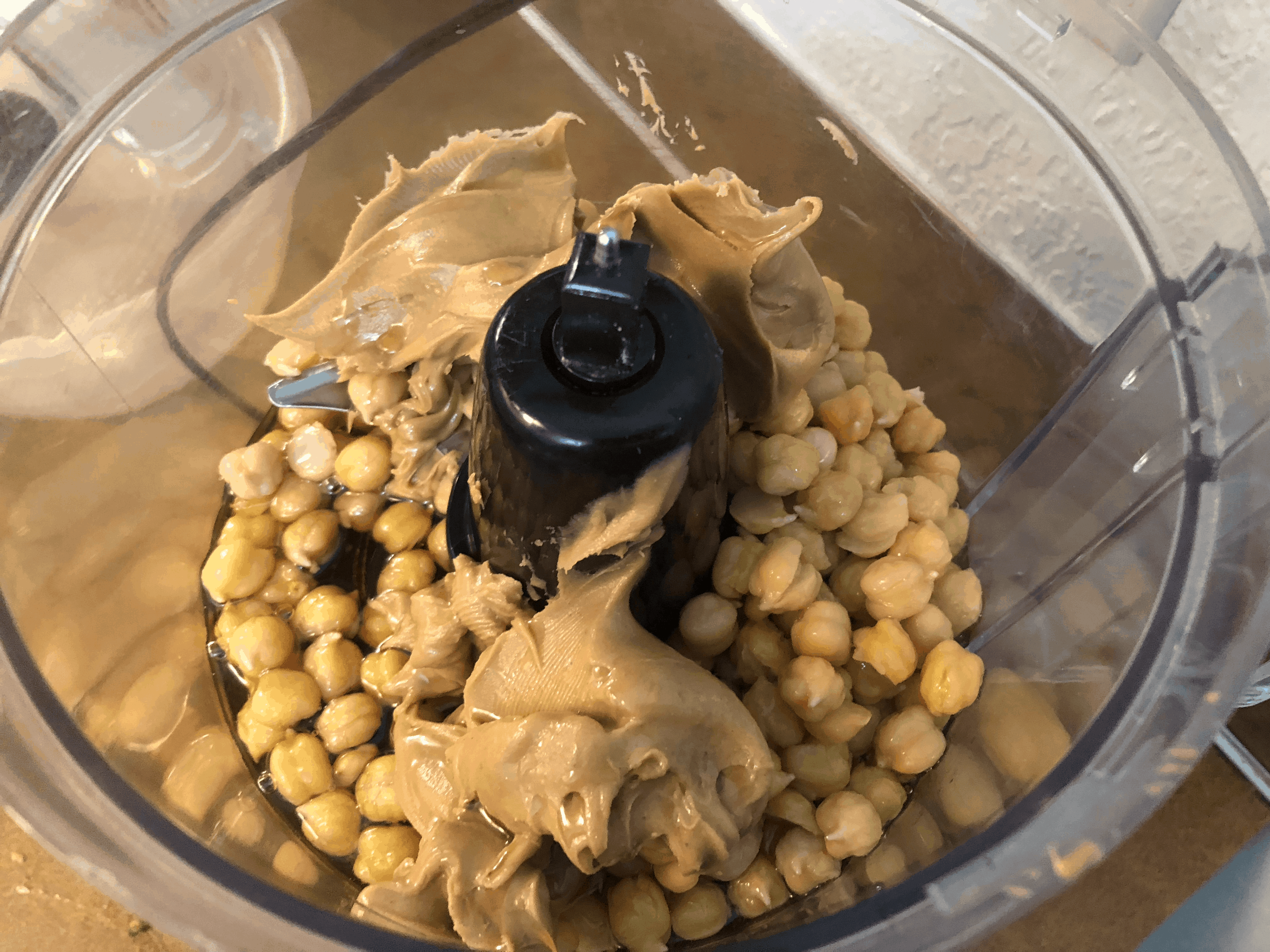 Looking for delicious and healthy chocolate chips cookie dough balls full of protein? These are gluten free, vegan, no bake, and kids love them! #chickpea #chickpeas #cookiedough #peanutbutterballs #veganrecipes #stresslessbehealthy