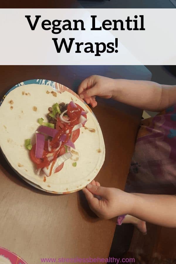 Looking for a healthy vegan wrap recipe that your kids will eat for dinners or lunches You'll want to make this veggie lentil wrap with a side of homemade fries! Absolutely a child, and mother, apporoved meal. #lentils #veganrecipes #veganrecipeswithpotatoes #healthyrecipes #stresslessbehealthy