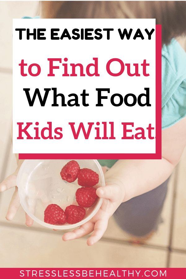 toddler holding bowl of raspberries, to show that it's not that hard to find out what food kids will eat