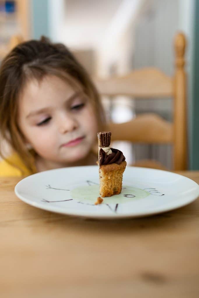 little girl with cupcake