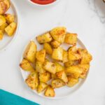 Overhead view of Vegan Breakfast potatoes on a small plate.