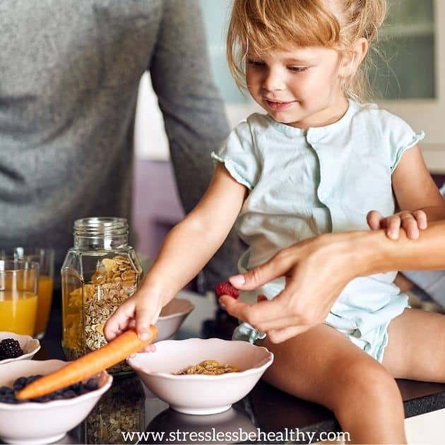 little girl helping make healthy food