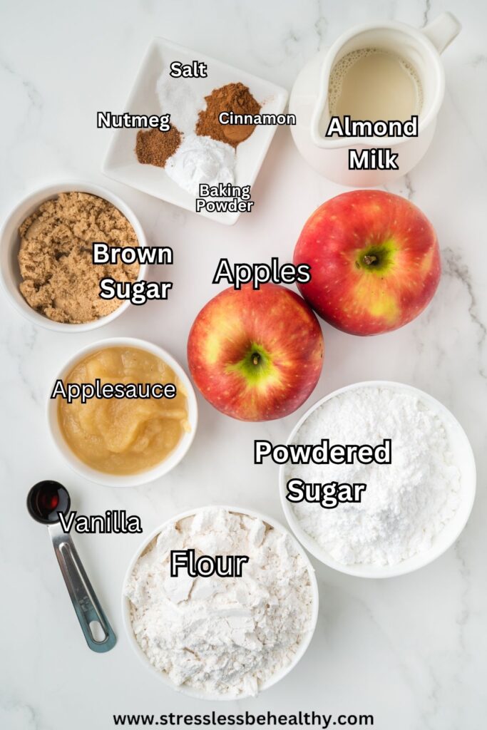 Vegan apple fritters ingredients, labeled, and on a white marble countertop.