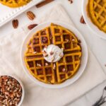 Overhead image of a Vegan pumpkin waffle served and ready to eat.