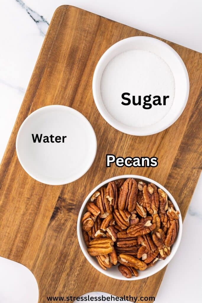 Candied Pecans ingredients on a wood cutting board.