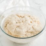 Vegan pizza dough after it has risen.