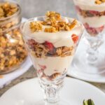Strawberry parfait in a fancy antique glass.