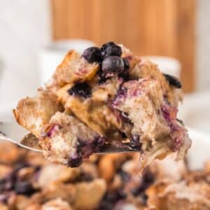 Vegan Blueberry French Toast Casserole on a spatula.